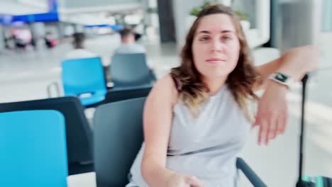 pensive young woman daydreaming at airport terminal