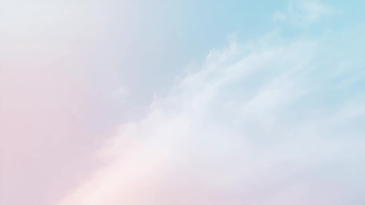 Drifting feathered cloud bank shifting across pastel pink to blue sky, prompted by breeze