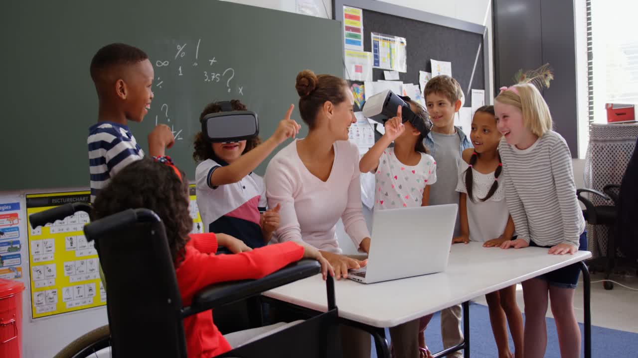 Front view of Mixed-race schoolkids using virtual reality headset with teacher and classmates i 4k