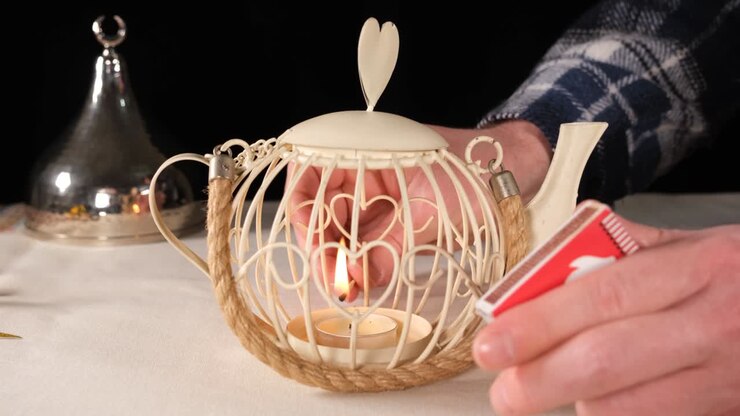 light a candle with a match