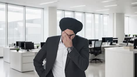 stressed and tensed sikh indian businessman