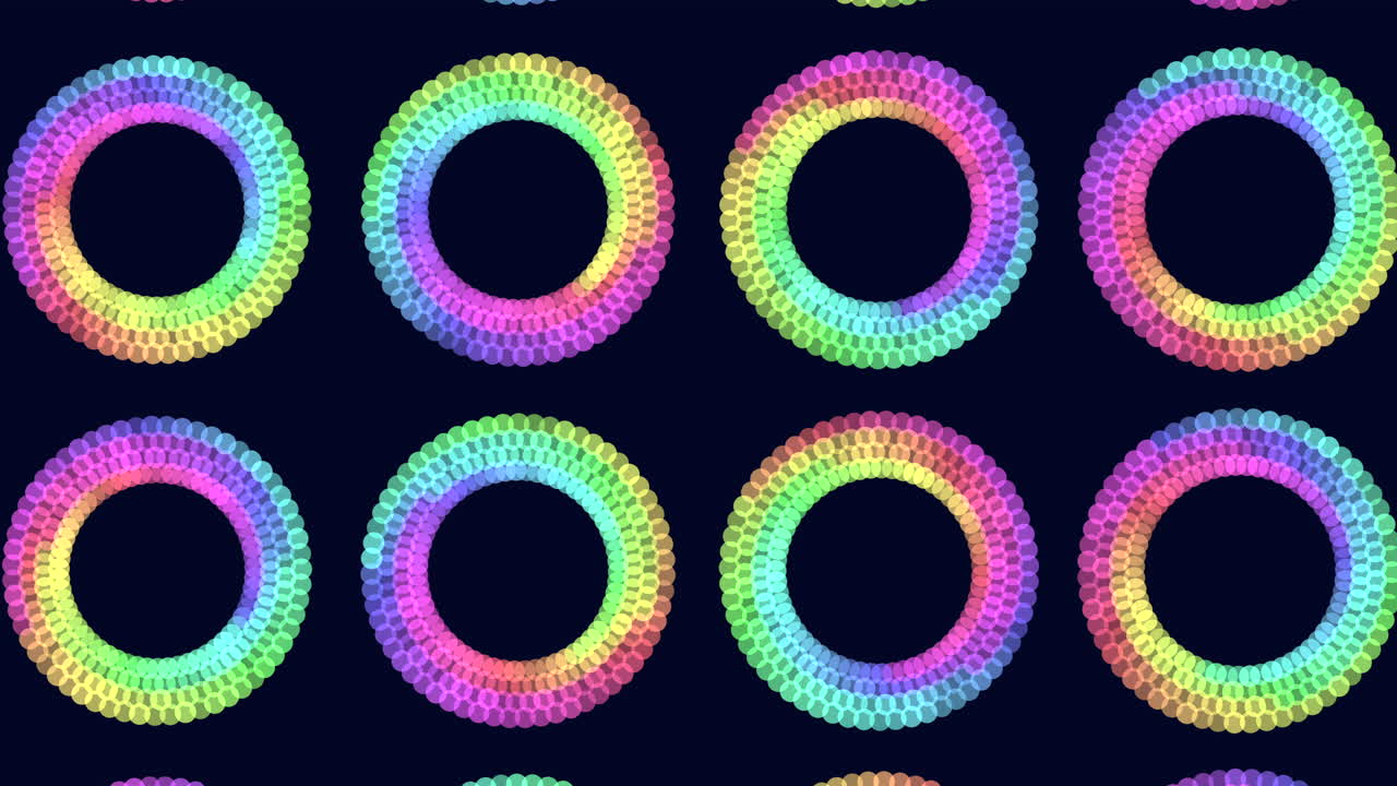 Abstract footage of repeating rainbow gradient rings made of small dots on a dark blue background, ideal for modern motion design, music visuals, and digital backdrops