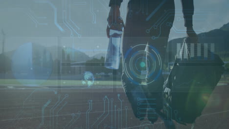 carrying sports bag and water bottle, person walking on track with digital interface animation