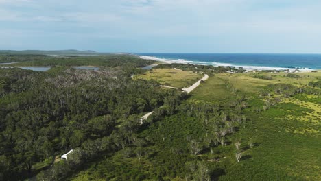 motorhome journey to campsite in yuraygir national park, captured from a breathtaking drone perspective