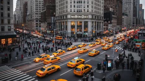 busy new york city street with yellow cabs and pedestrians at dusk