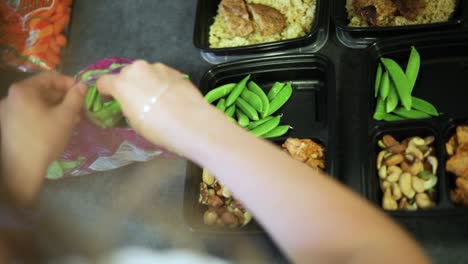 slow motion shot of someone doing weekly meal planning