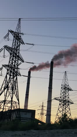 high voltage power lines station. high voltage electric transmission pylon towers