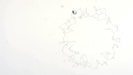 animation of ring of network rotating, with uncut diamonds falling on white background