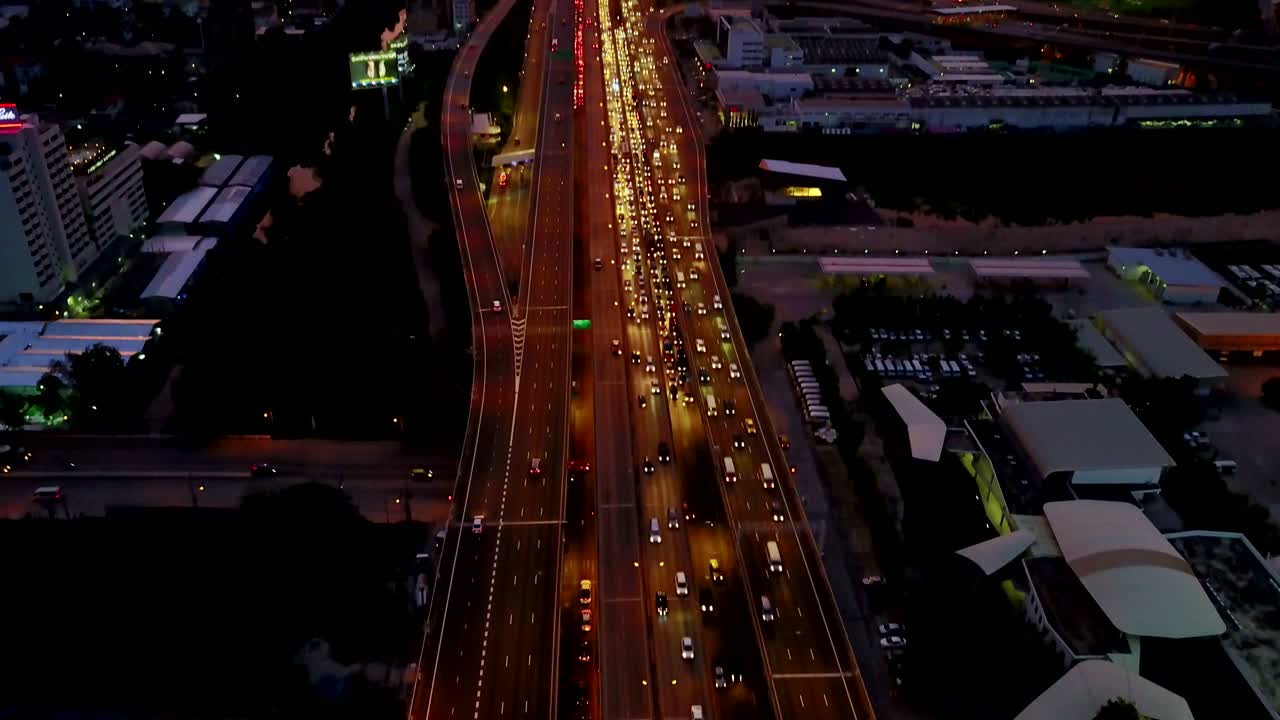pan up scene of highway road in urban city, aerial scene