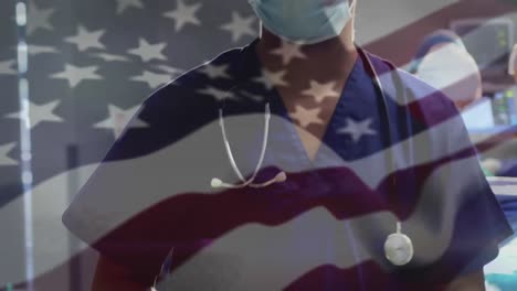 animation of waving usa flag and thumbs up icon over portrait of biracial male surgeon at hospital