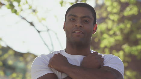 Smiling-African-American-man-gesturing-outdoor.