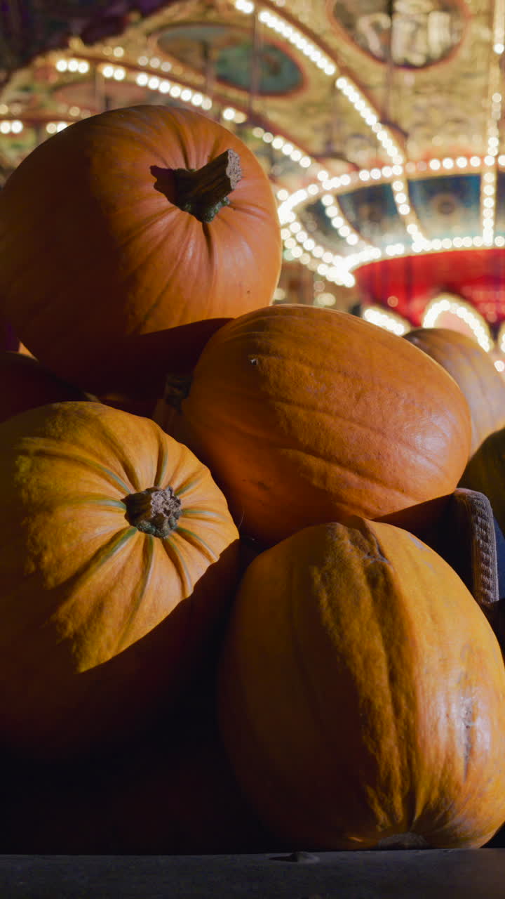 Halloween decorations in the Tivoli Gardens amusement park in Copenhagen, Denmark at night. Vertical