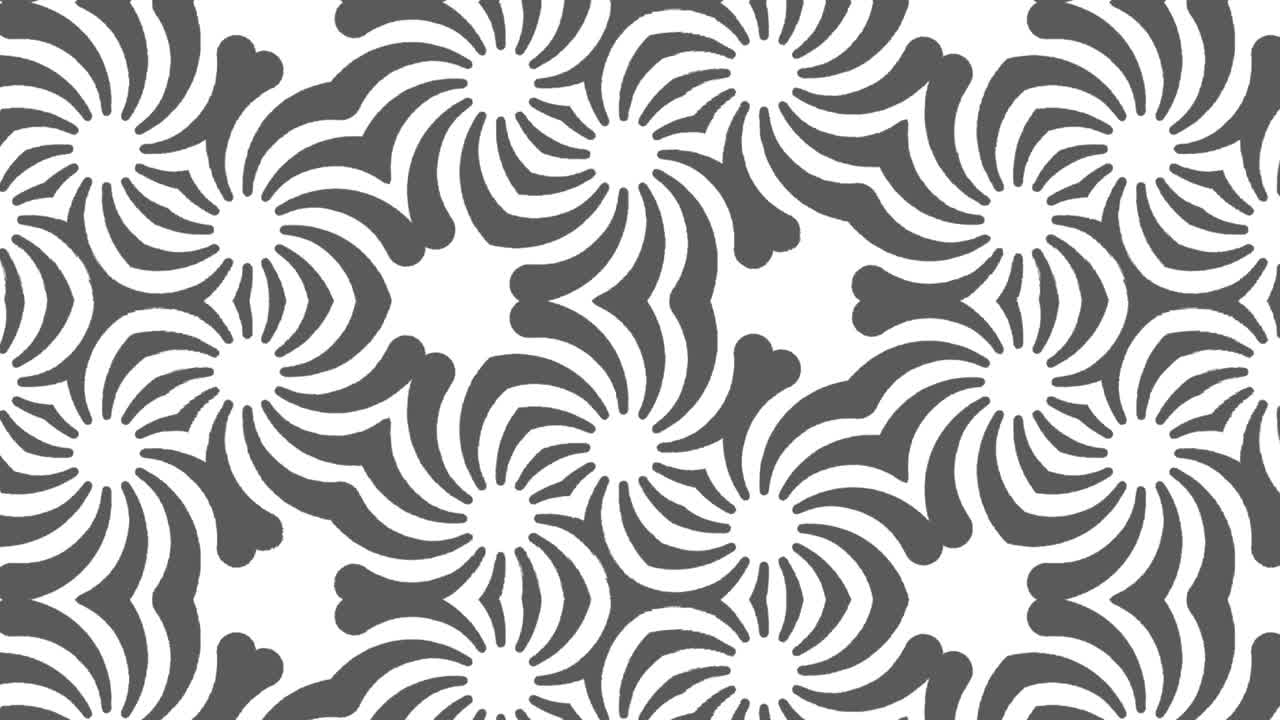 검은색과 색의 그래픽 패턴은 스트로보스코픽과 최면 효과를 가지고 있으며, 크기가 커지고 그 다음에는 줄어든다.