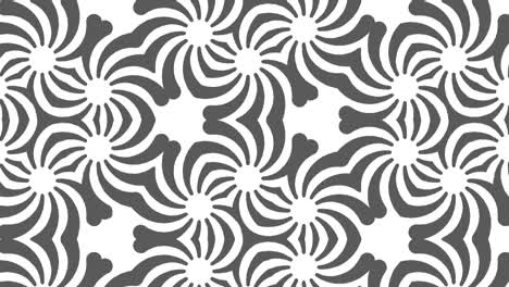 patrón gráfico en blanco y negro con efecto estroboscópico e hipnótico, mientras aumenta en tamaño y luego lo reduce.
