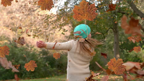 animation of autumn leaves falling over happy caucasian woman in park