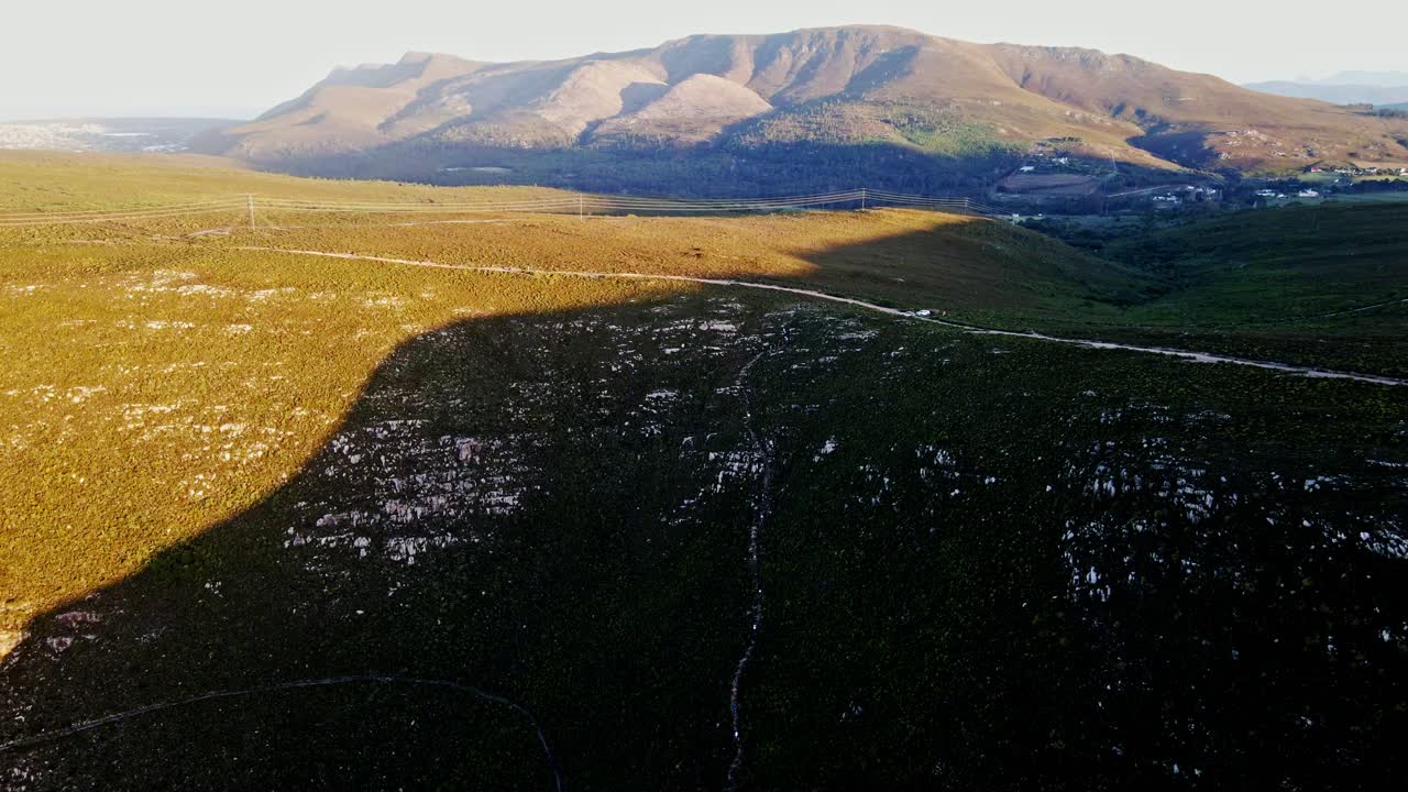 Mountains with tracks, roads and trails