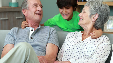 Grandparents-with-grandson-in-living-room