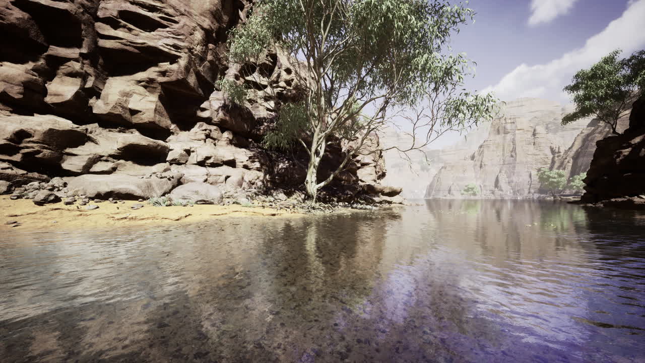 Majestic riverbank surrounded by towering cliffs and lush greenery in daylight