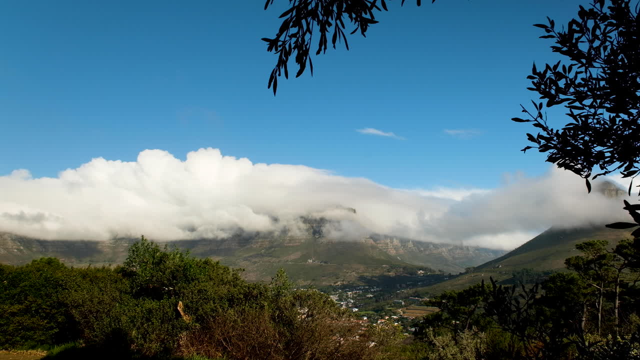 Elevated view of Table Mountain and Lion's Head covered with clouds