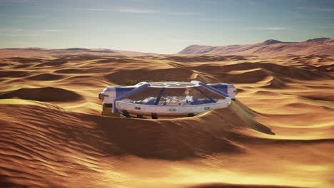 edificio de vidrio futurista en las dunas del desierto