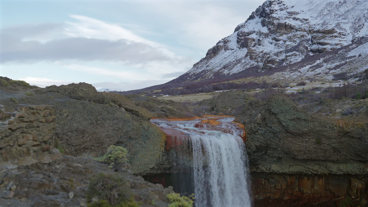 Panoramic drone fly from the top of the Salto del Agrio majestic waterfall, Neuquén, Argentina