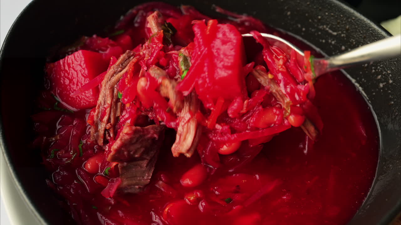 Close up of a bowl of borscht at a restaurant