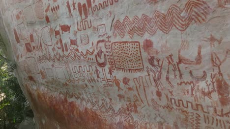 drone close-up shot of ancestral paintings in cerro azul, colombia