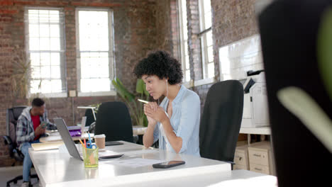 happy diverse colleagues having video call in office in slow motion