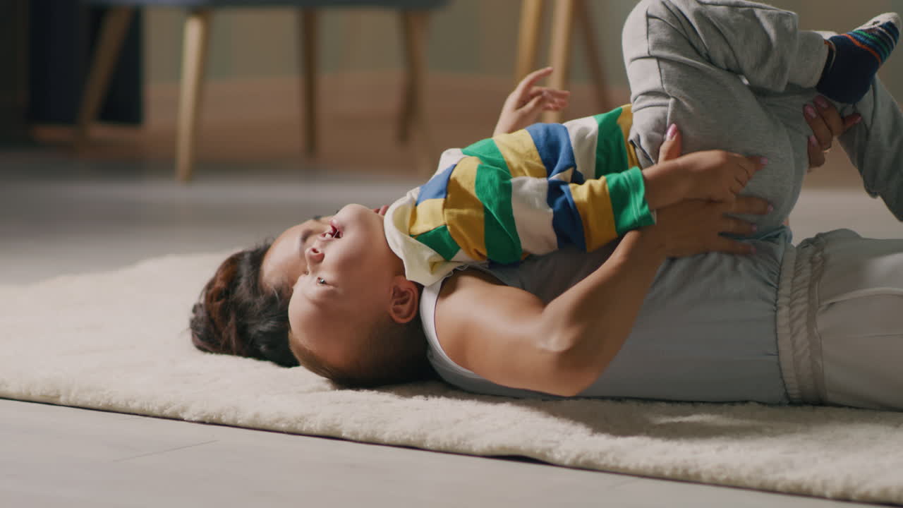 Mother and Child Playing on the Floor