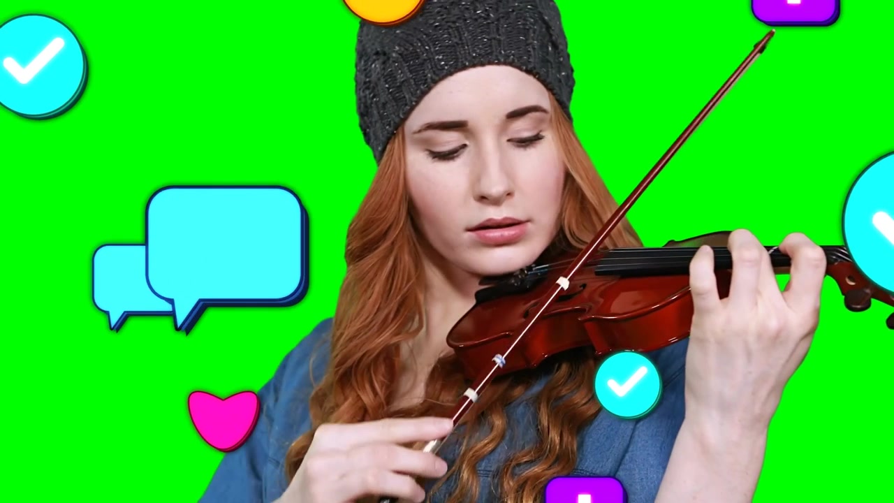 Violinist begynder at stryge på grøn skærm, animerede sociale ikoner svæver omkring hende og viser likes
