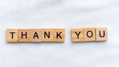 a creative expression of thanks using wooden blocks highlighting the importance of gratitude.