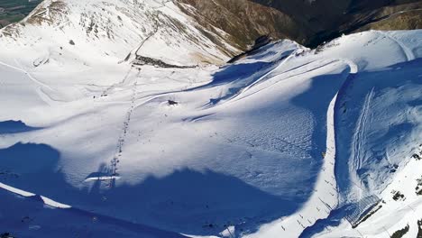 Aerial---Incredible-view-of-ski-resort-and-stunning-landscape-atop-Mt