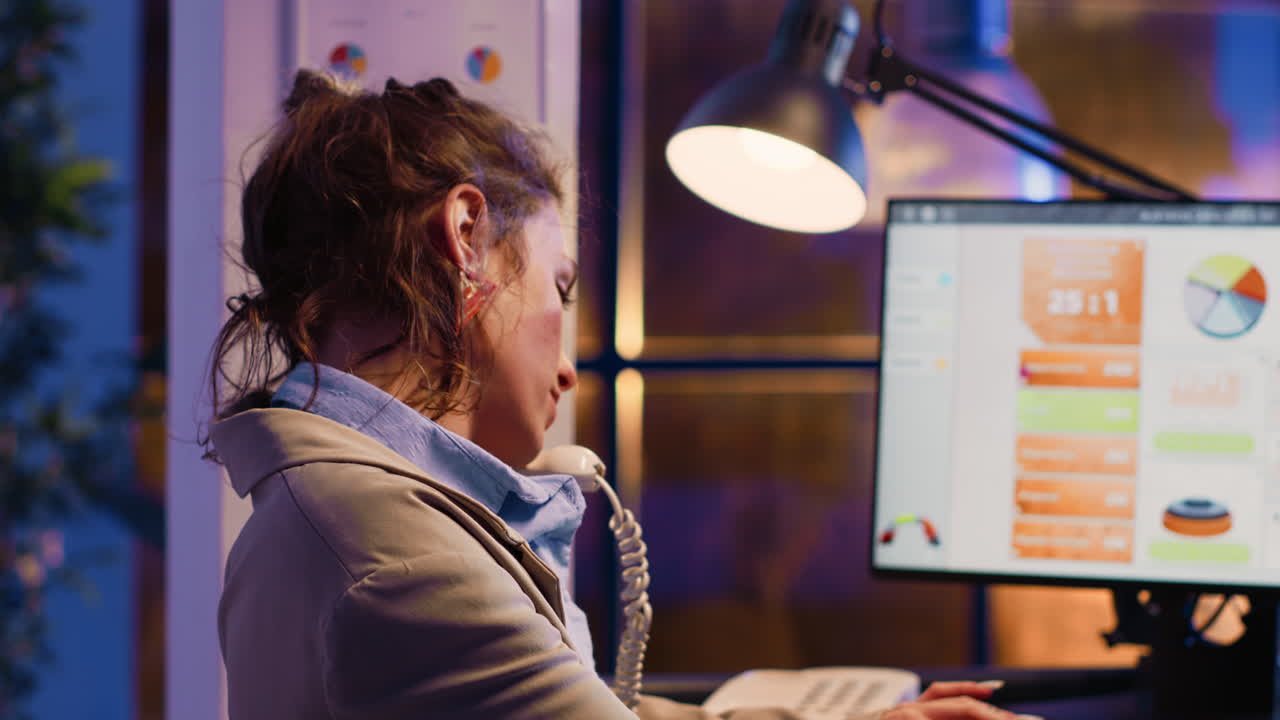 Businesswoman working late at her desk