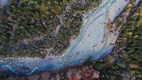 aerial view of cirque de gavarnie valley, lush with trees and flowing stream