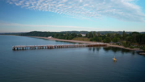 pier of orlowo beckons observer to world of serene beauty in aerial view