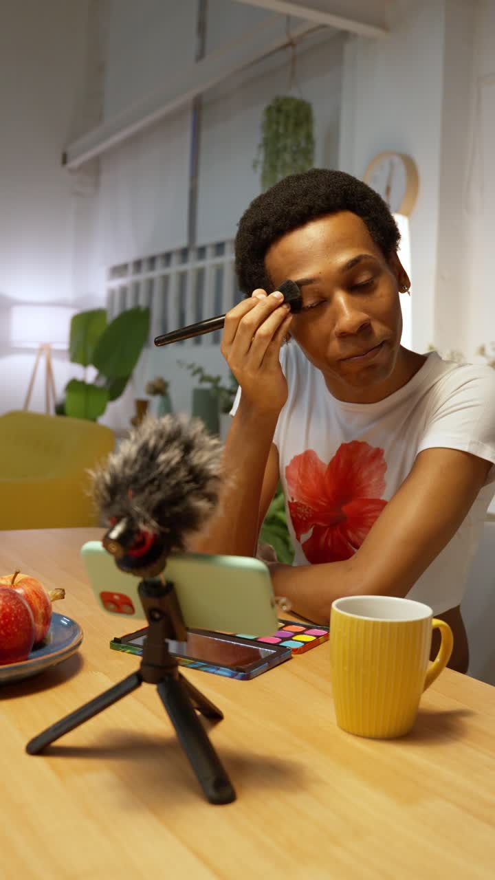 Makeup vlogger applying makeup