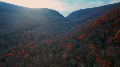 Aerial-drone-video-footage-of-the-magical,-beautiful-Appalachian-Mountains-during-fall-autumn-with-beautiful-golden-light-and-skies