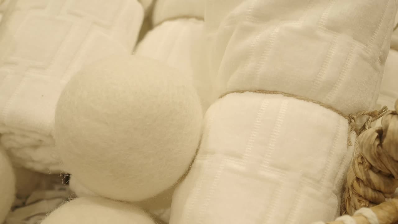 White Laundry Balls and Towels