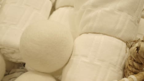 white laundry balls and towels