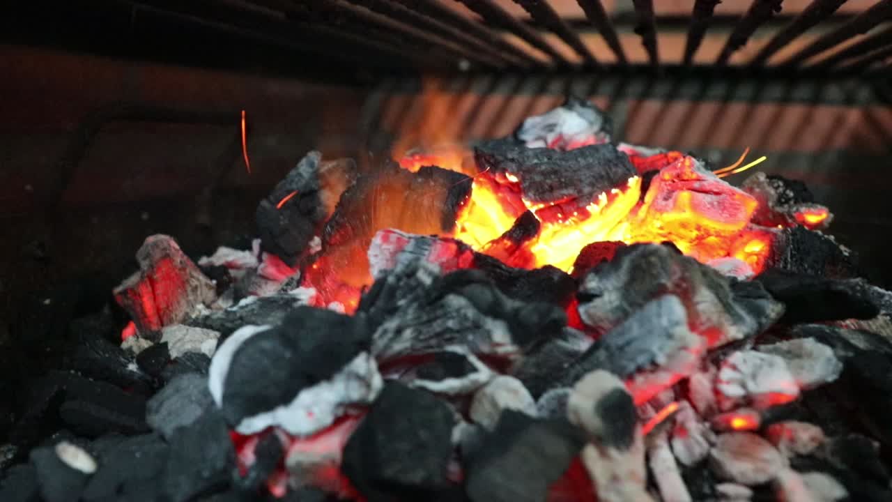 Hot Charcoal Briquettes in a BBQ Grill
