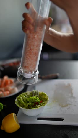 preparing guacamole