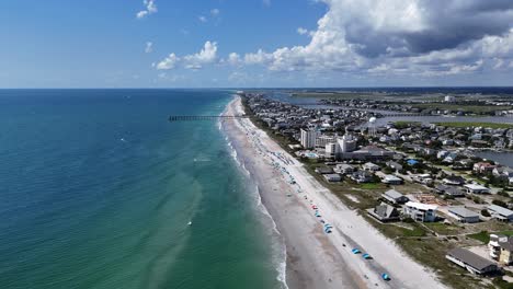 Breathtaking Aerial View of a Stunning Coastal City and its Beautiful Beachfront Area the Breathtaking Aerial View Beautifully Showcases a Stunning Cityscape Sandy Beach and Serene Waters