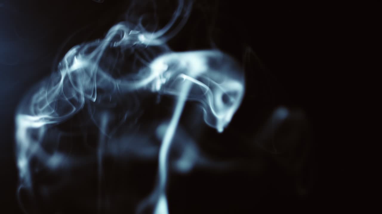 fondo negro de 4k de partículas, polvo y humo en movimiento