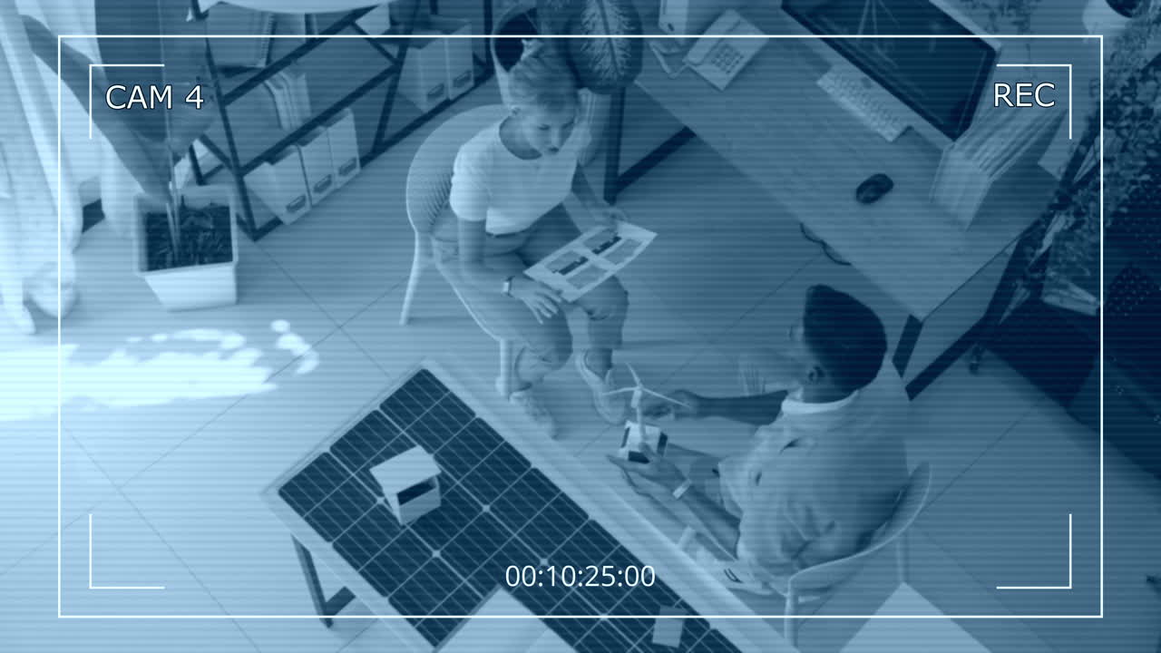 CCTV of Specialists Discussing Wind Turbines Implementation in Business