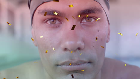 animation of confetti falling over biracial male swimmer