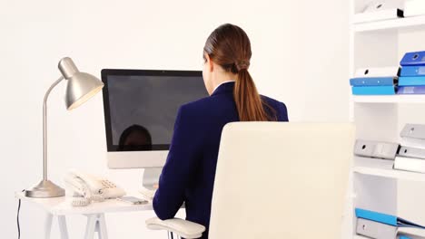 Businesswoman-working-in-office