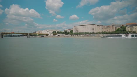 Boat-ride-through-Danube,-summer-afternoon,-approaching-Petofi-bridge