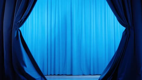 a blue curtain on a stage