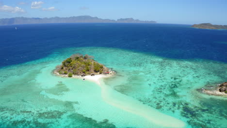 aerial view of bulog dos island and turquoise water, in the sunny day, coron, palawan, philippines