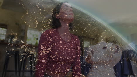 animation of woman with dog in cozy home with abstract golden light